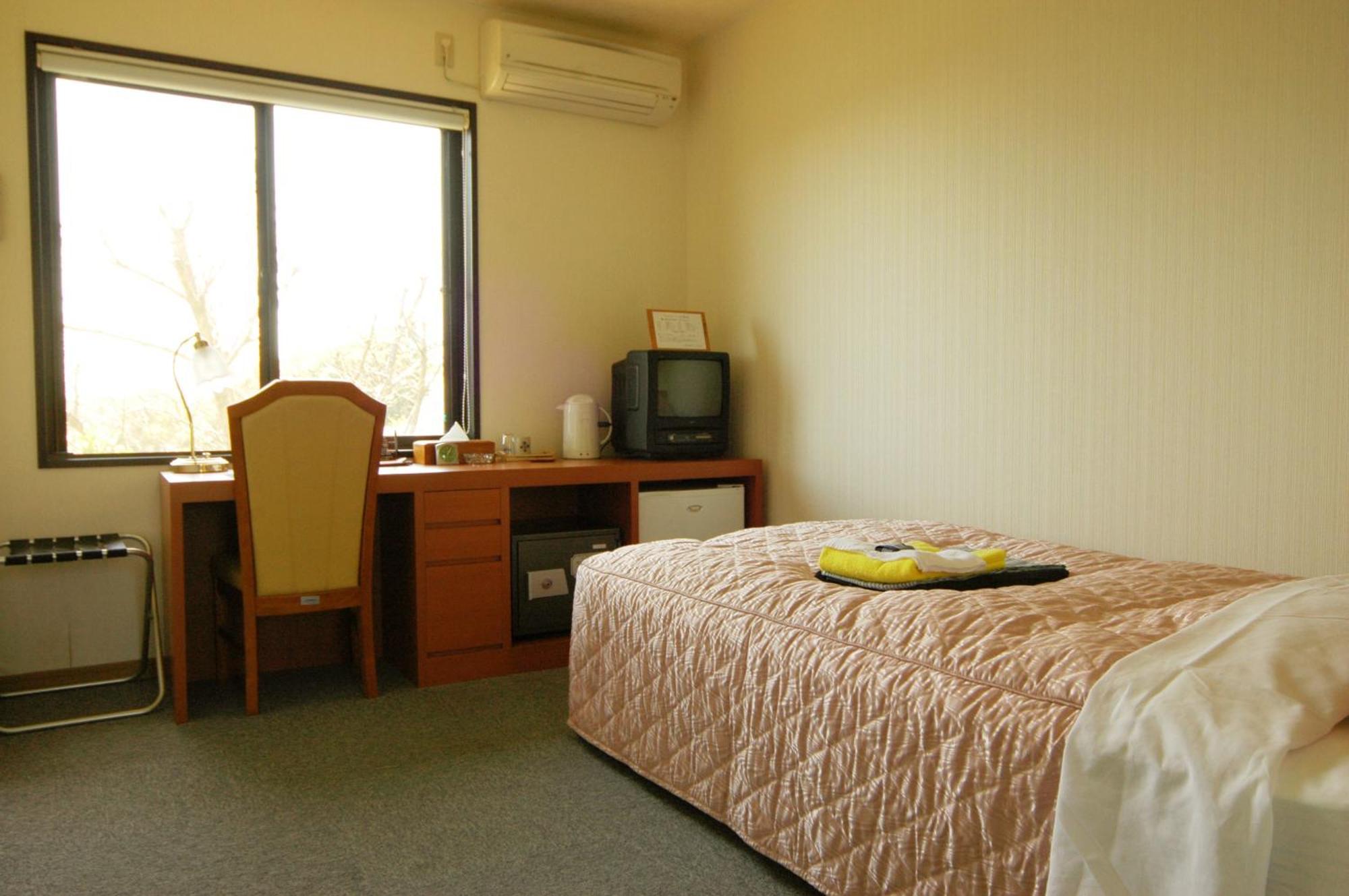 Yakushima Green Hotel Rum bild